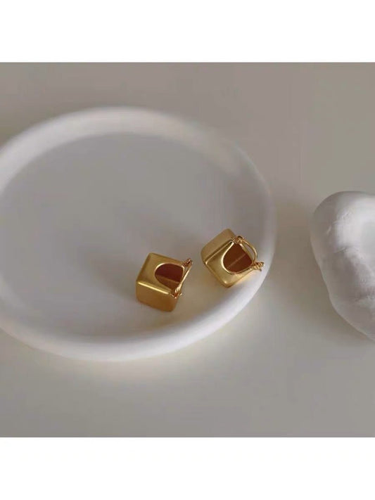Matte square hoop earrings in gold with a geometric modern design for a bold yet elegant look.